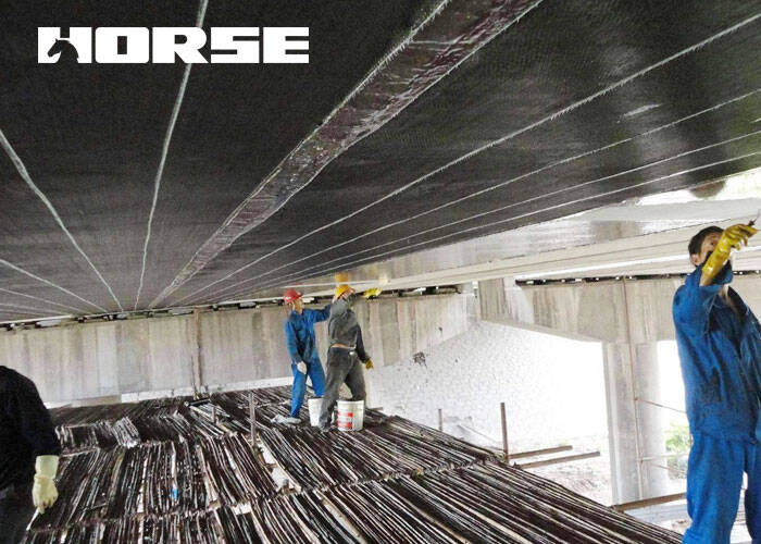 Pasting carbon fiber on bridge Pasting carbon fiber on bridge