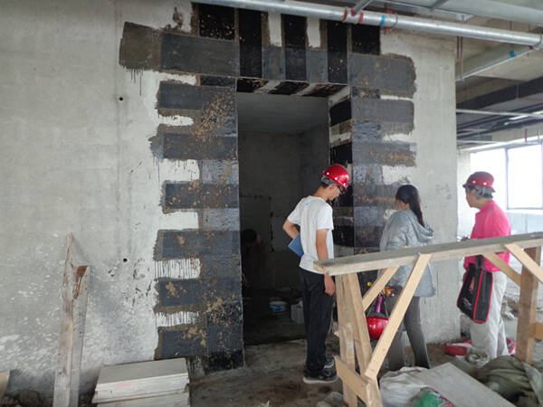 FRP Strengthening of Shear Walls with Openings FRP Strengthening of Shear Walls with Openings