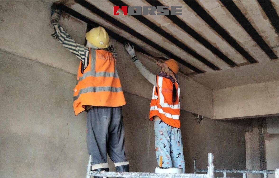 Slabs strengthening by carbon fiber Slabs strengthening by carbon fiber