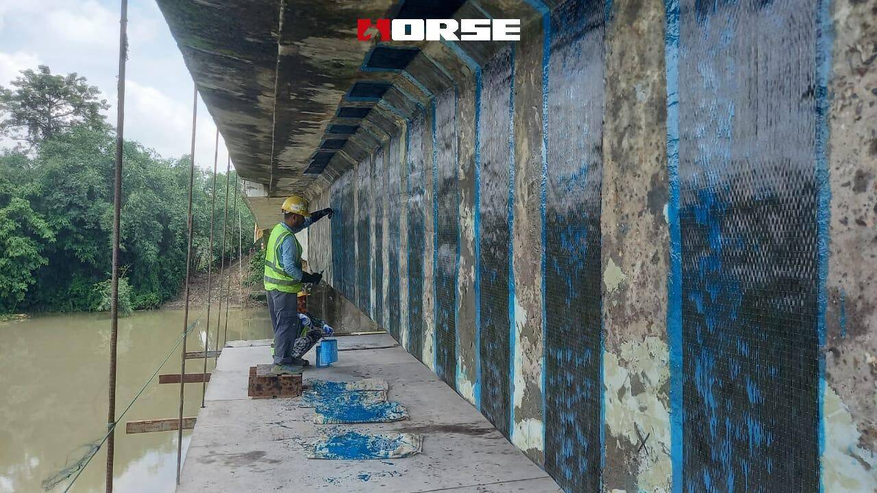 CFRP Composite System Reinforce Bridge with Rebars Corroded CFRP Composite System Reinforce Bridge with Rebars Corroded