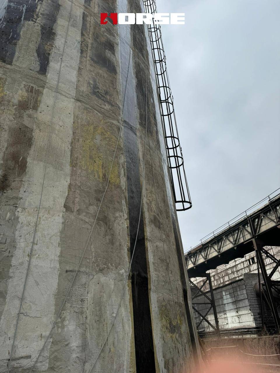 Carbon Fiber Reinforcement in Chimneys with Cracks and Exposed Rebars Carbon Fiber Reinforcement in Chimneys with Cracks and Exposed Rebars